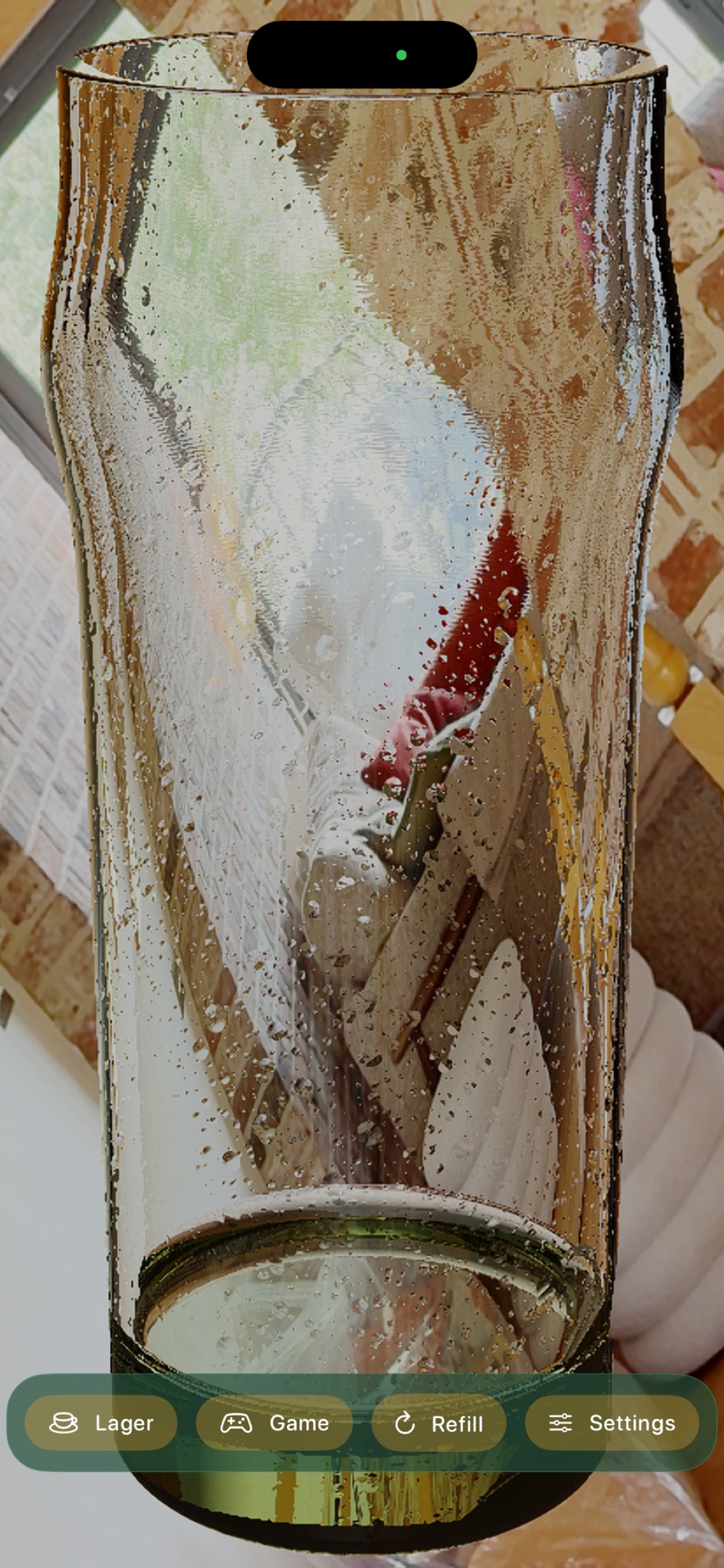 An emptied glass, showing a different room refracted through it