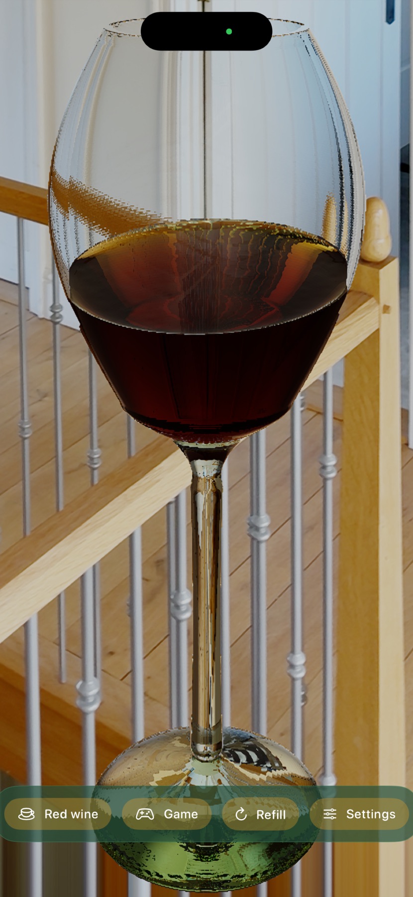 A stemmed red wine glass with a rounder, larger bowl, tilted to drink, in front of a staircase